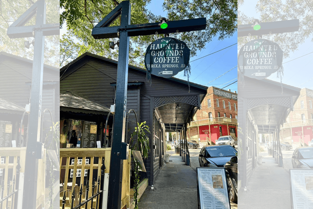 Sign for "Haunted Ground Coffee" outside a building in Eureka Springs, Arkansas.